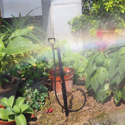 Boussole d'atomisation par réfraction d'irrigation de jardin avec pulvérisateur de contrôle de la pression d'eau